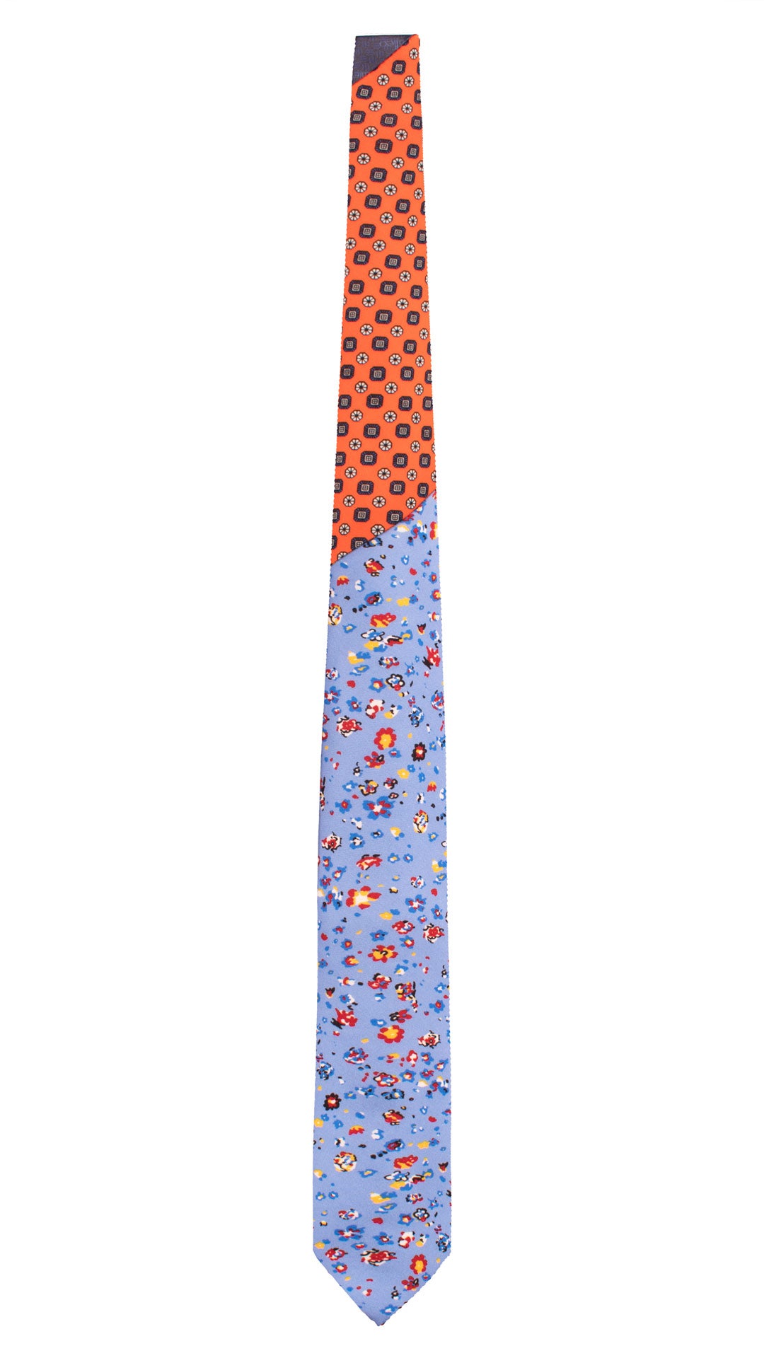 Cravatta Stampa di Seta Azzurra Fantasia Multicolor Nodo in Contrasto Arancione Fantasia Blu Bianco Nero N3312 Graffeo Cravatte Made in Italy Intera