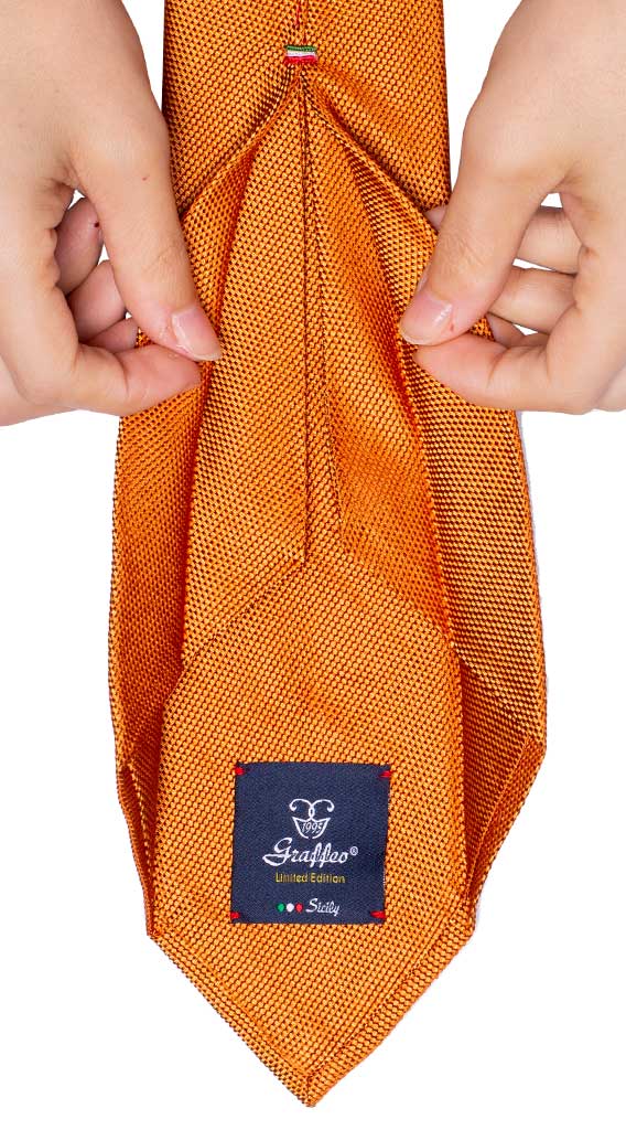Cravatta Sette Pieghe di Seta Arancione Micro Fantasia Tono su Tono Made in Italy Graffeo Cravatte